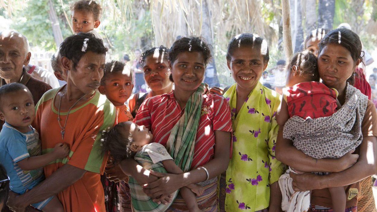 Group of Women Holding Children. Photo credit: UN/Martine Perret